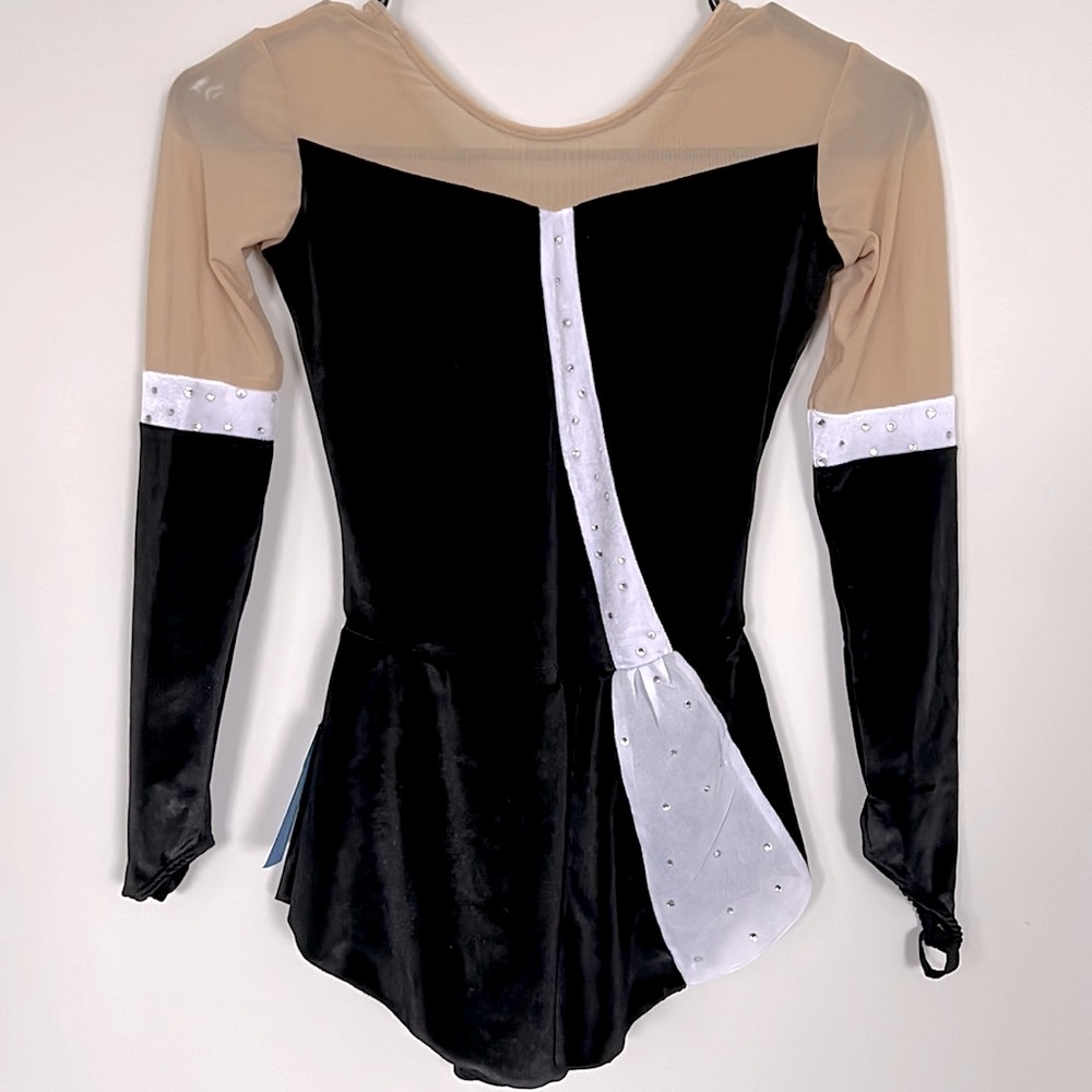 NWT BLACK VELVET FIGURE SKATING DRESS. Long sleeve. Pull on. Girls Size 10-12.